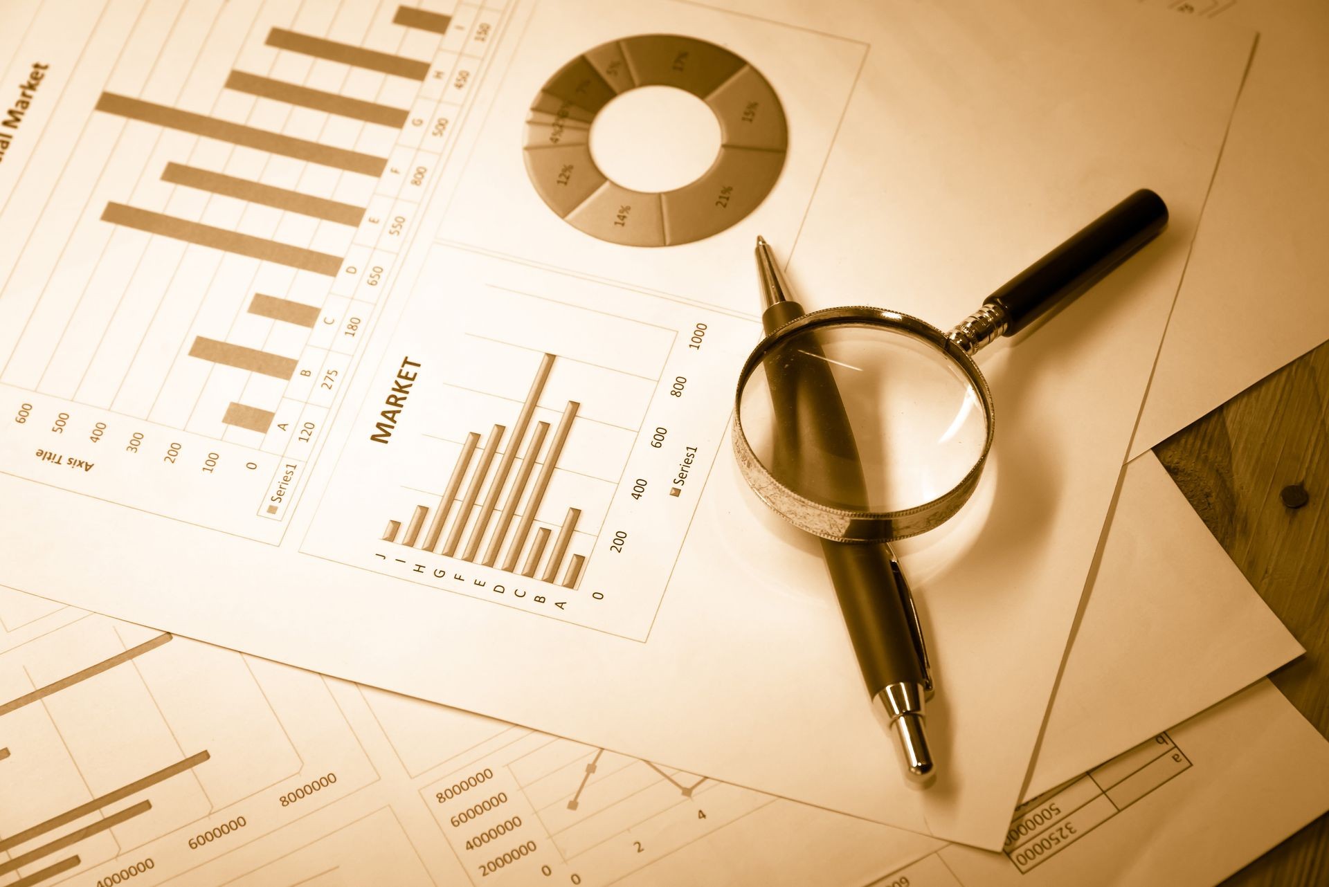 Data analyzing in forex market with magnifying glass, pen and calculator : the charts and summary info on paper. Charts of financial instruments for technical analysis. Data analyzing in forex market with magnifying glass, pen and calculator : the charts and summary info on paper. Charts of financial instruments for technical analysis.